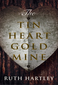 The cover shows a tin heart nailed to a tree with the book title in gold across it