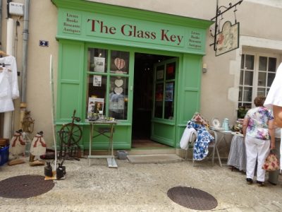 The green front of the Glass Key bookshop with its doors open