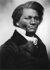 Black and white photo of a handsome black man in a white cravat and black jacket